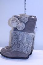 A new pair of Muks fur lined boots size 39