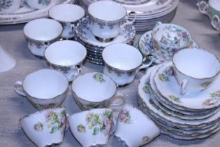 A selection of part tea services including Royal Albert and Minton 'Haddon Hall'. Shipping