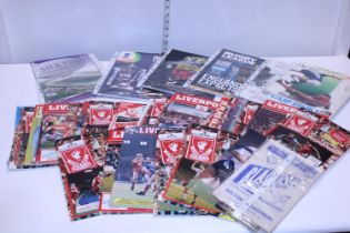 A job lot of assorted football programmes etc