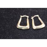 A pair of 9ct gold square earrings 0.75g