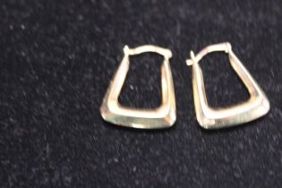 A pair of 9ct gold square earrings 0.75g