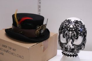 A new steampunk style hat and a ball masque