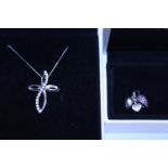 A boxed Pandora charm and a boxed Pandora necklace and pendant