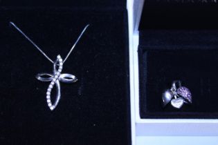 A boxed Pandora charm and a boxed Pandora necklace and pendant