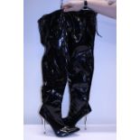 A new pair of thigh length stiletto boots size 12
