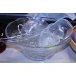 A vintage glass punch bowl with ten cups