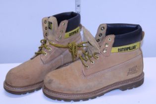 A pair of lightly worn size 11 Caterpillar boots