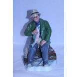 A Royal Doulton figurine A Good Catch HN2258