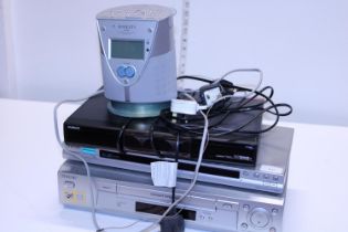 A selection of assorted audio/visual equipment including a Roberts CD, alarm clock & radio. Shipping