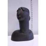 A piece of studio pottery by Lynn Lovitt entitled 'Black head'.