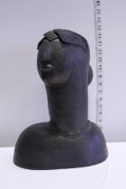A piece of studio pottery by Lynn Lovitt entitled 'Black head'.