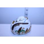 A boxed Royal Crown Derby paperweight with stopper, sleeping dormouse