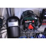 A 240v electric welder & mask. No shipping.