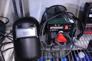 A 240v electric welder & mask. No shipping.