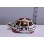A boxed Royal Crown Derby paperweight with gold stopper 'Turtle'