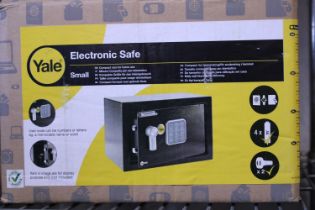 A new boxed Yale electronic safe.