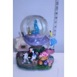 A Disney Store Alice in Wonderland musical snow globe