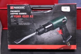 A new boxed pneumatic chipping hammer.