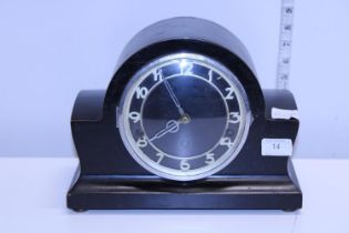 An Art Deco period wooden cased mantle clock