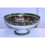 A hand decorated footed bowl