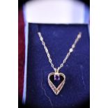 A 9ct gold chain and pendant 1.27g