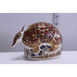 A boxed Royal Crown Derby paperweight with gold stopper, 'Armadillo'