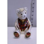 A boxed Royal Crown Derby paperweight with gold stopper Debonair Bear
