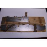 Three sets of 5 inch gauge stainless steel chassis parts, for a 4-6-0 locomotive and two tenders. No