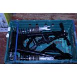 A tray full of assorted motorbike spare parts, shipping unavailable