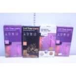 Four new boxed LED tree lights (untested)