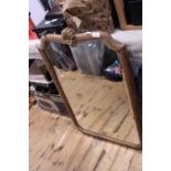 A vintage oak framed mirror with bevelled edge glass. No shipping.