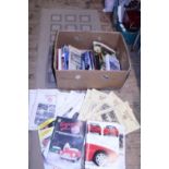 A box of assorted vintage motoring books/magazines etc