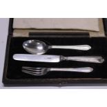 A hallmarked silver christening knife, fork and spoon set