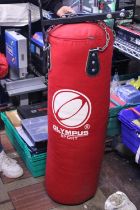 A punch bag with ceiling bracket. No shipping.