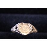 A 9ct gold coin ring 1.37g size T
