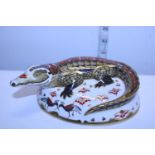 A boxed Royal Crown Derby paperweight with gold stopper & COA, Golden signature edition Crocodile