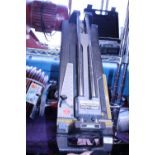A large manual tile cutter. No shipping.