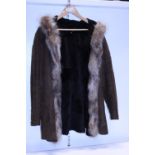 A vintage suede coat with fur trim
