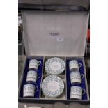 A boxed Anysley bone china coffee service retailed by Harrods