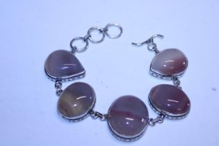 A 925 silver bracelet with coloured stones