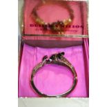 A boxed Butler and Wilson elephant topaz bangle