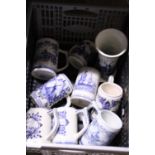 A selection of Delph ware tankards etc