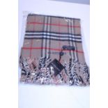 A new with tags tan Burberry scarf