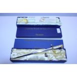 Two boxed Nauticalia miniature royal navy swords