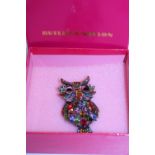 A boxed Butler and Wilson Owl brooch