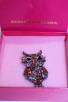 A boxed Butler and Wilson Owl brooch