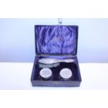 A hallmarked silver dressing table set