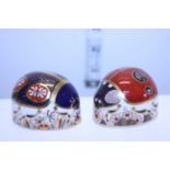 Two Royal Crown Derby Lady Bird paperweights with silver stoppers