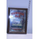 A small advertising mirror for Hunters Ale