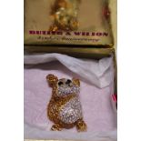 A boxed Butler and Wilson Monkey brooch